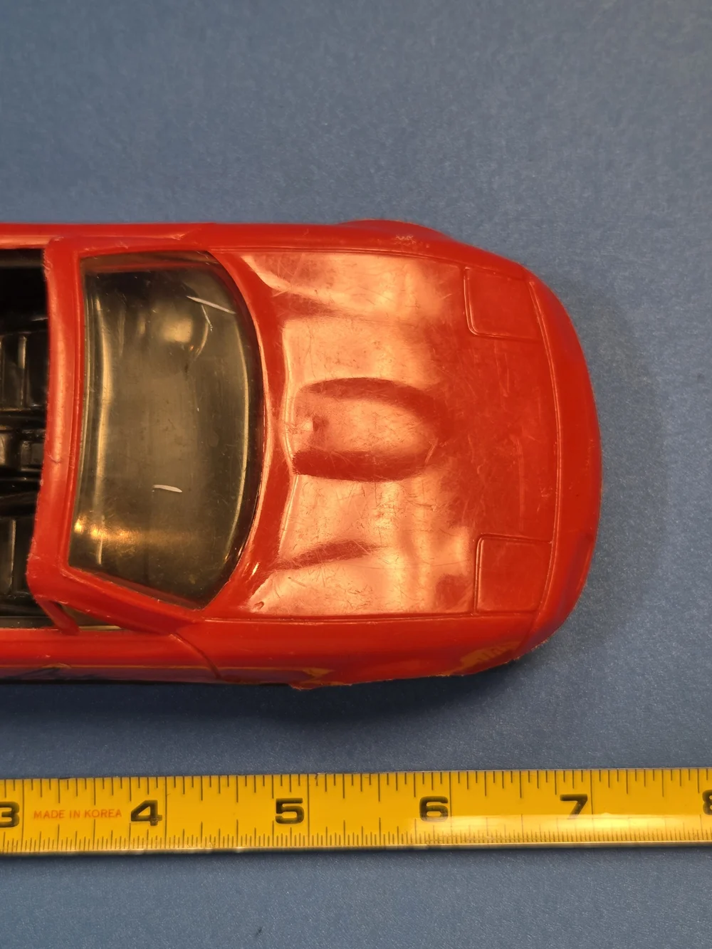 Red Convertible Toy Car with Signature-Style Side Graphic